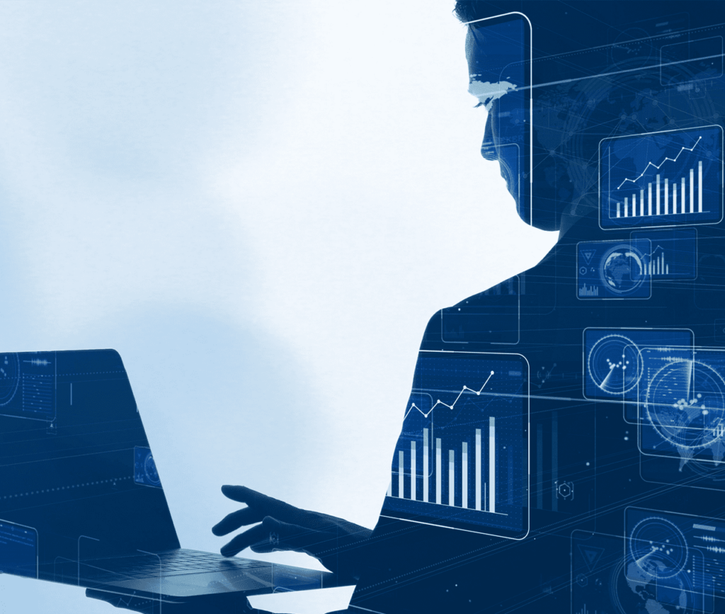 Technology concept photo a person working on their laptop and data being overlaid with many charts, trend lines, insights and further metrics.