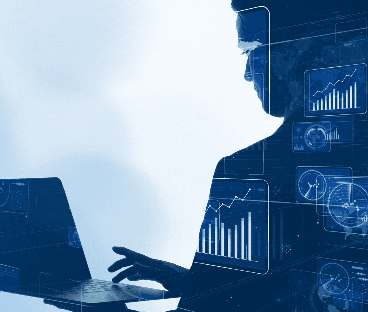 Technology concept photo a person working on their laptop and data being overlaid with many charts, trend lines, insights and further metrics.