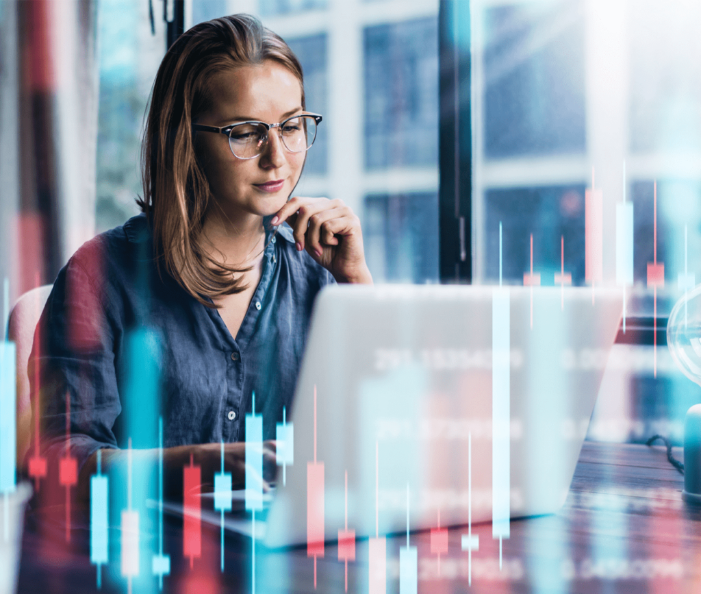 Female data analyst reviews reports on her computer as data is superimposed on the photo in this concept art.